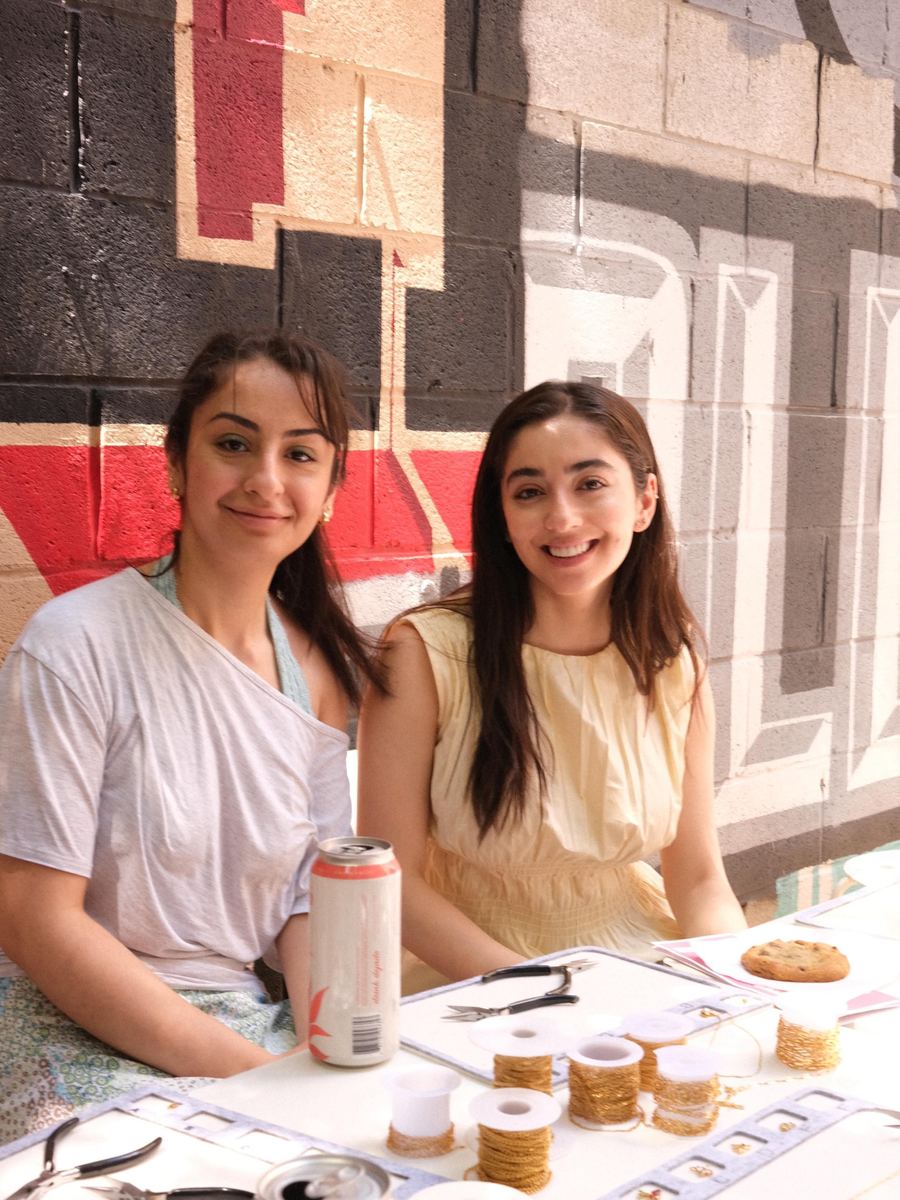 Two guests at the workshop table
