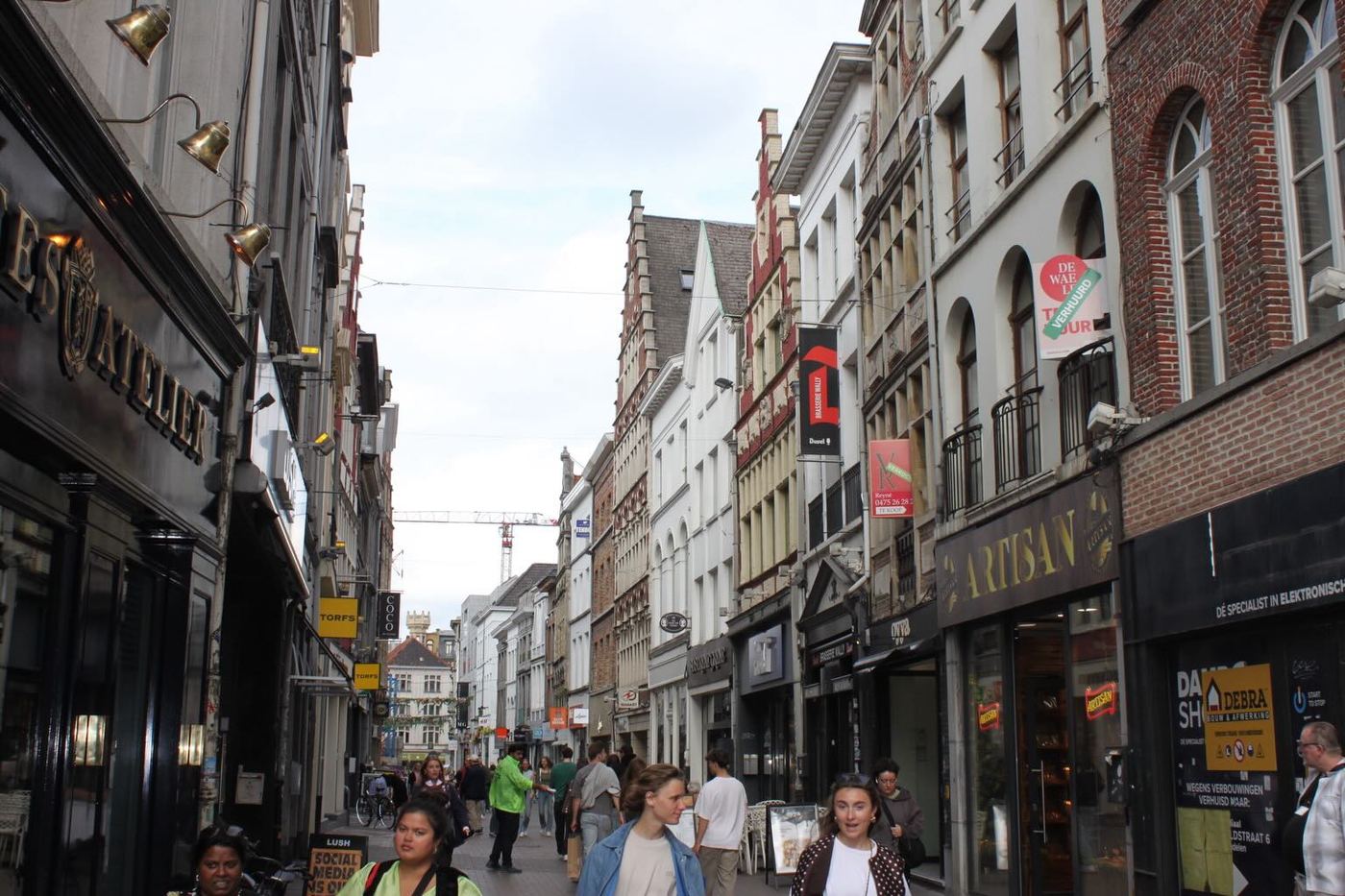 People walking down a shopping street