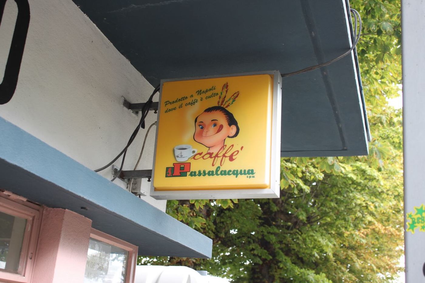 A vintage caffe sign
